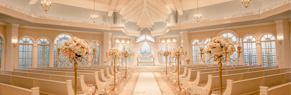 Disney S Wedding Pavilion Florida Weddings Escape Collection Sunlight Shines Through The Arched Stained Gl Windows Of A Wedding Chapel With Chandeliers And